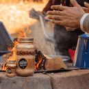 Ole Smoky Moonshine Butter Pecan 750cc. con fuego de fondo. 